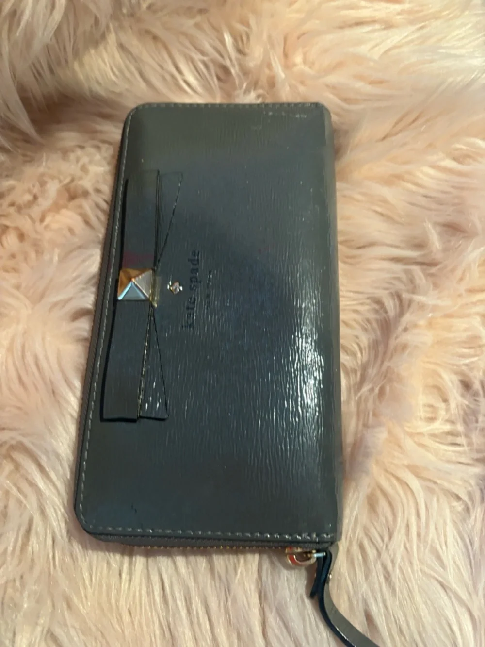 grey Kate Spade Beacon Court patent leather wallet